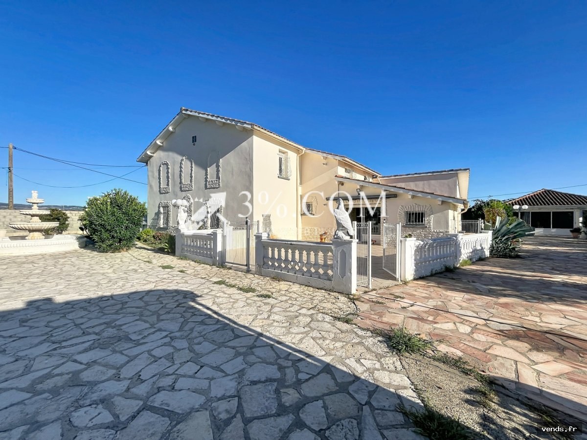 Maison 10 pièce(s) 7 chambre(s) 300.59 m²